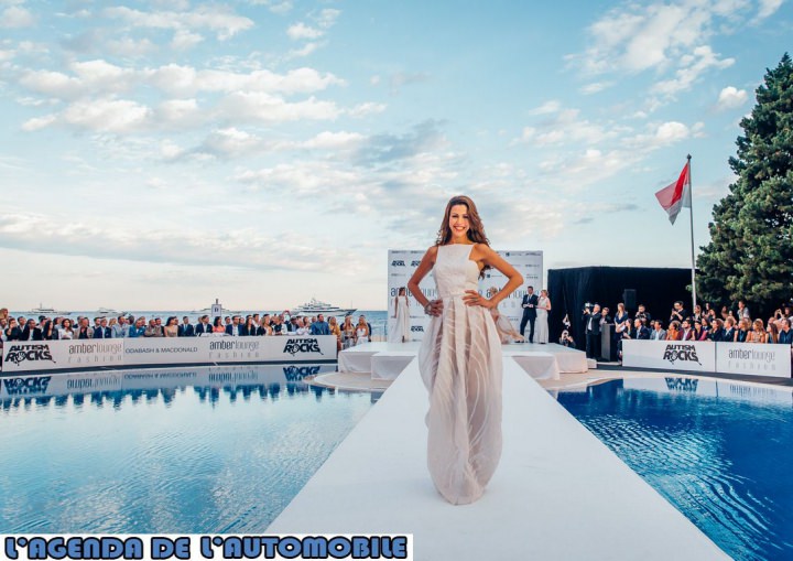 A model walks the runway at the Amber Lounge 2015 Charity Fashion Show in benefit of Autism Rocks, at Monaco.